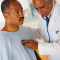Listening to Patient's Heartbeat with Stethoscope