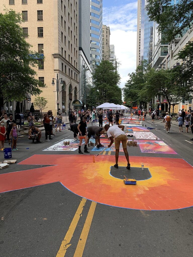 Charlotte, NC Artists Put A New Spin on #BLM Street Murals