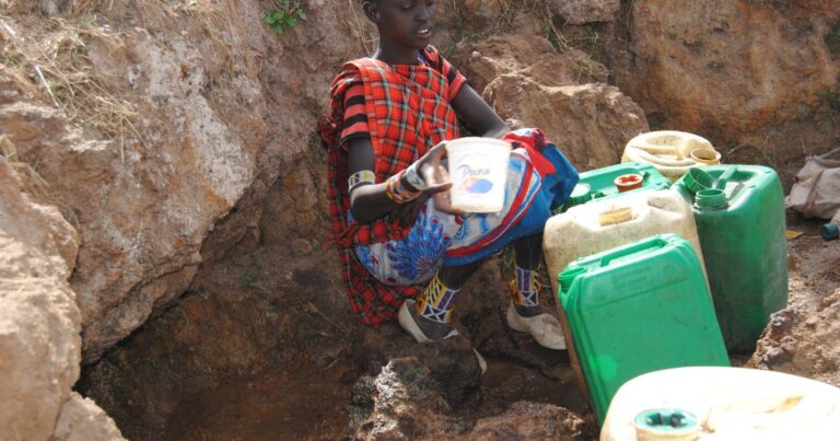 Maasai Girl Fetching Water From The Cave