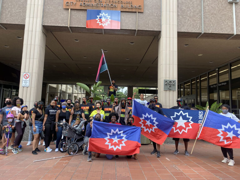 Fit, Black & Educated Relay Ends with Juneteenth Flag Over City Hall