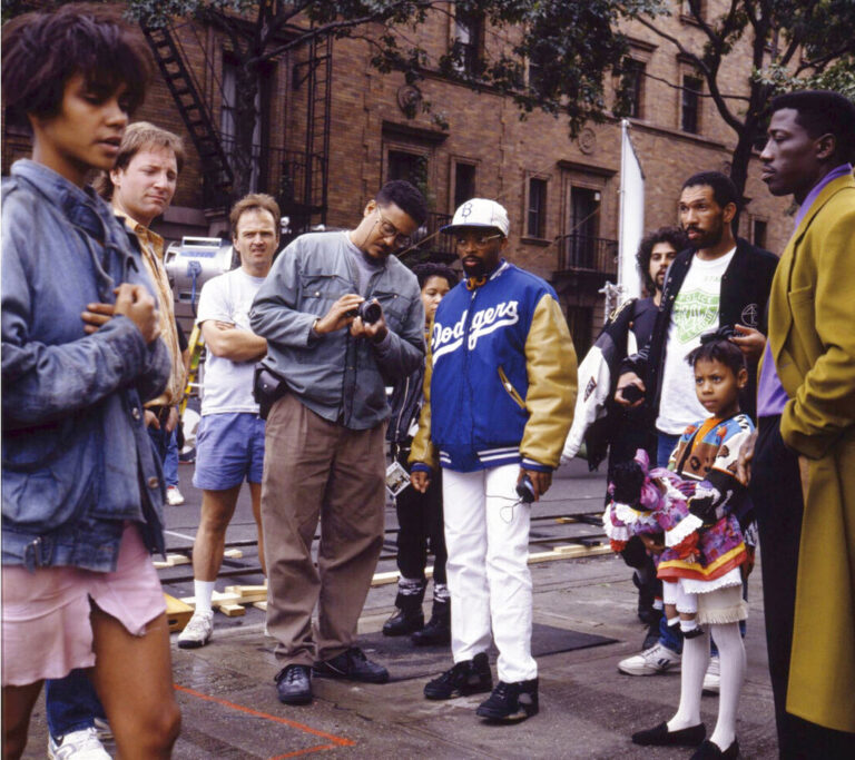 Filmmaker Spike Lee, center right, appears with cinematographer Ernest Dickerson, center left, with cast members, including Halle Berry, left, and Wesley Snipes, right, on the set of the 1991 film, 