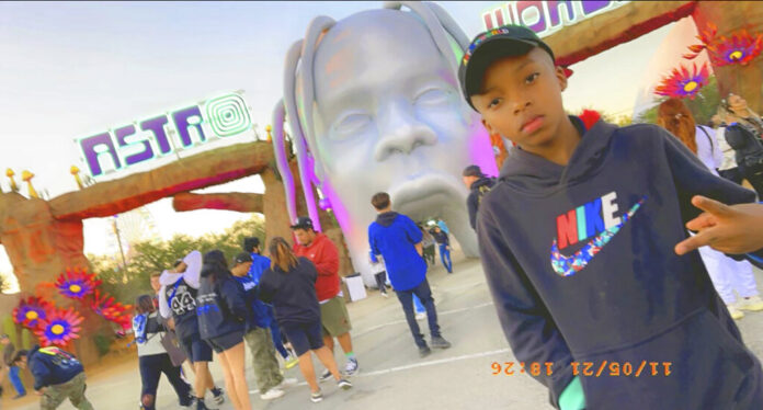 Ezra Blount, 9 years old, posing outside the Astroworld music festival by Travis Scott in Houston.
