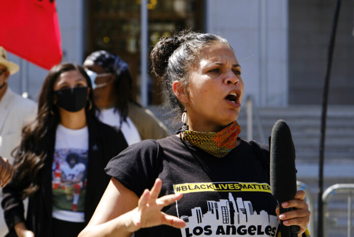 Melina Abdullah speaks during a Black Lives Matter protest at the Hall of Justice in downtown Los Angeles.