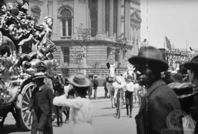 A screenshot of Black parade go-ers from the 1902 Ringling Bros. Parade Film that has been inducted into the National Film Registry.