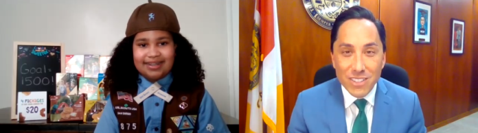 Mayor Gloria and Brownie Scout Madison meet to talk about the upcoming Girl Scout Cookie Season