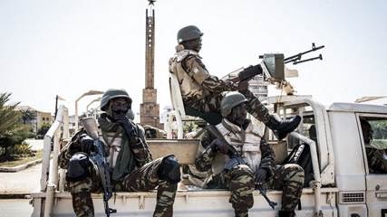 AFRICAN TROOPS HEAD FOR GUINEA BISSAU AFTER A DEADLY COUP ATTEMPT LINKED TO THE DRUG TRADE