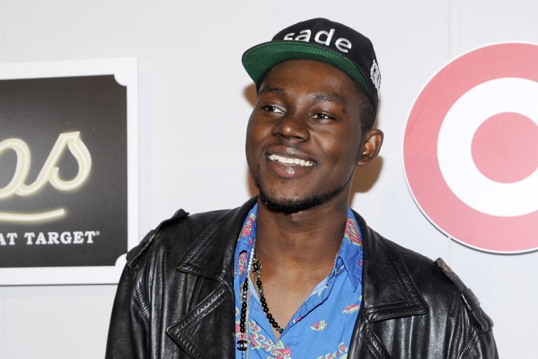 Rapper Theophilus London Smiling At The Event
